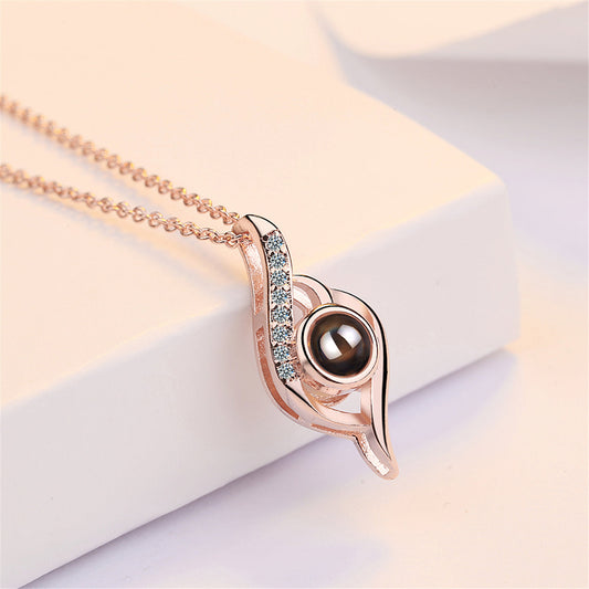 Cubic Zirconia and 18K Rose Gold-Plated Swirl Pendant Necklace, rose gold pendant necklace for women, front view