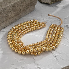 Luxurious 18K gold-plated beaded necklace with a trendy chain, designed to make a bold fashion statement.
