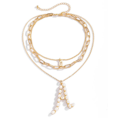 Pearl and 18K Gold-Plated 'A' Initial Pendant Necklace, gold pendant necklace for women, botanical inspired, lifestyle look