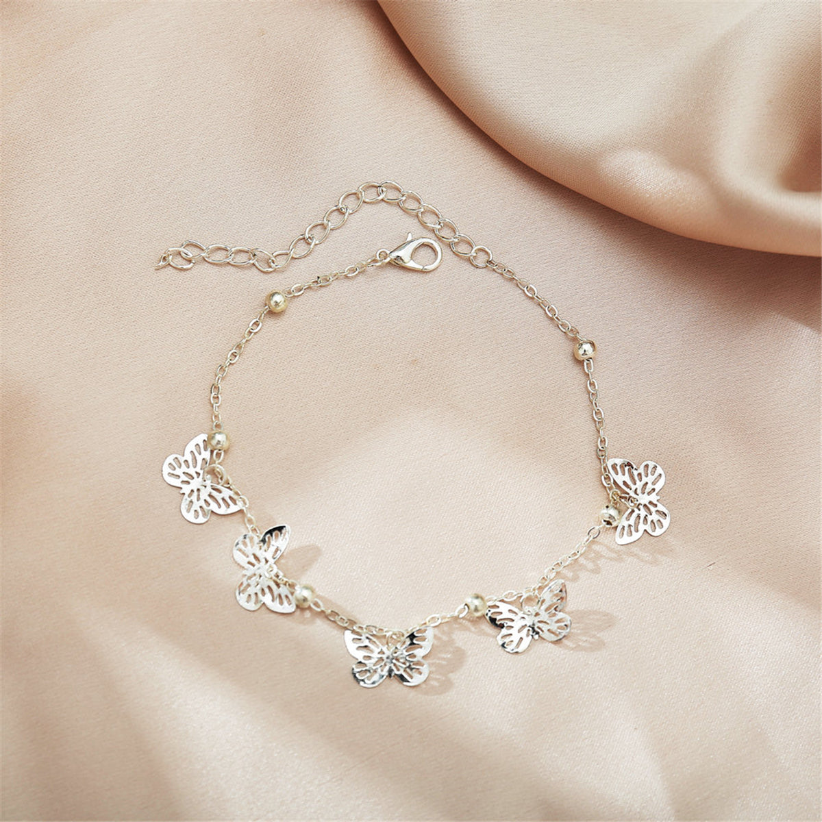 Silver-Plated Butterfly Station Anklet, silver anklet bracelet, dainty minimalist design, side view