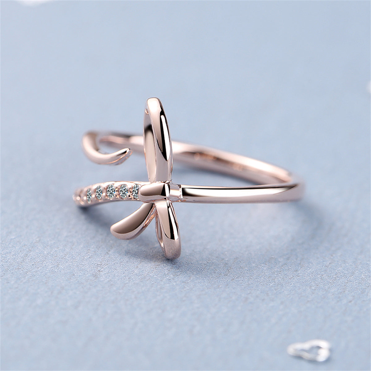 Cubic Zirconia and 18K Rose Gold-Plated Pavé Openwork Bow Bypass Ring, rose gold statement rings for women, detail close-up