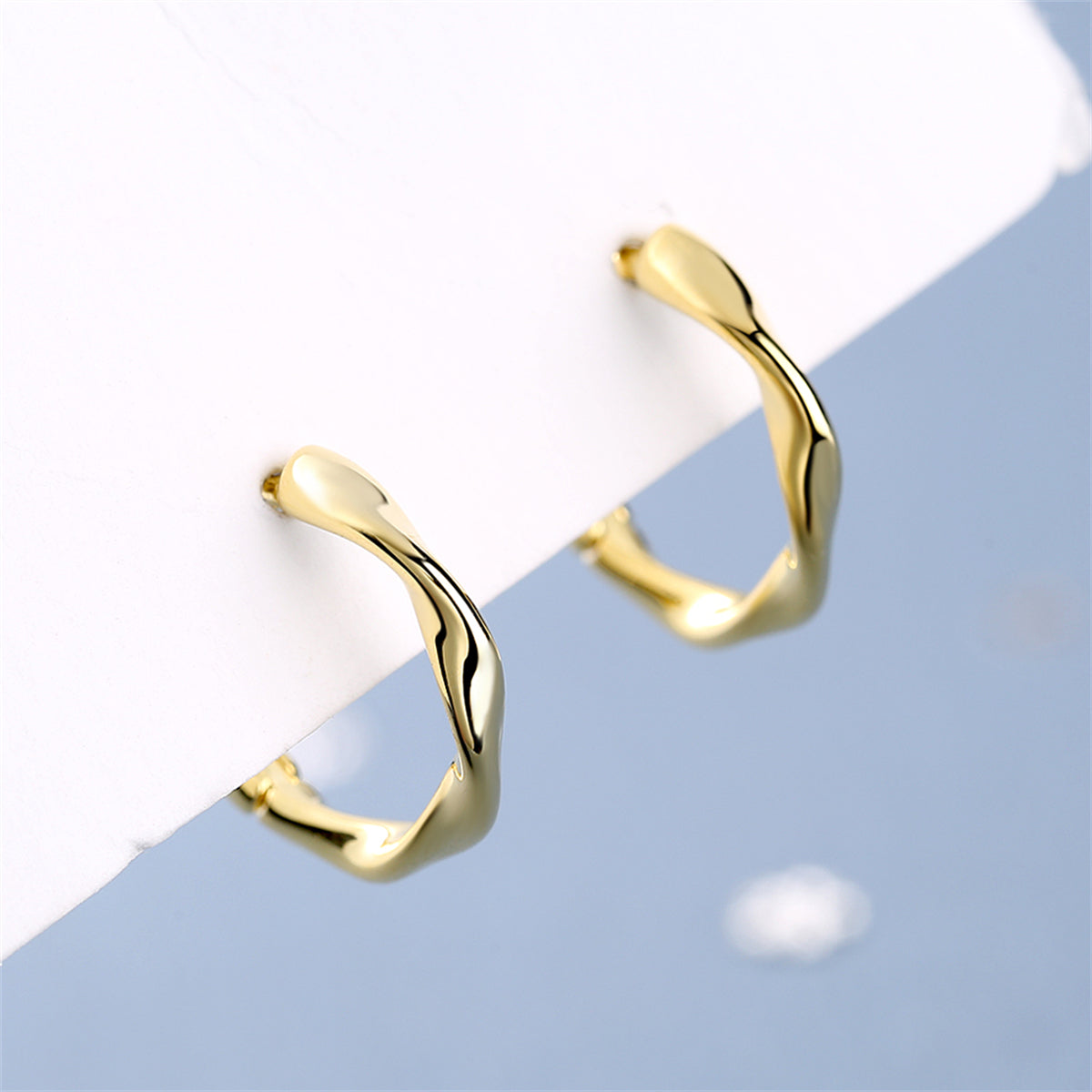 18K Gold-Plated Wave Huggie Earring, gold huggie earrings, botanical inspired, detail close-up