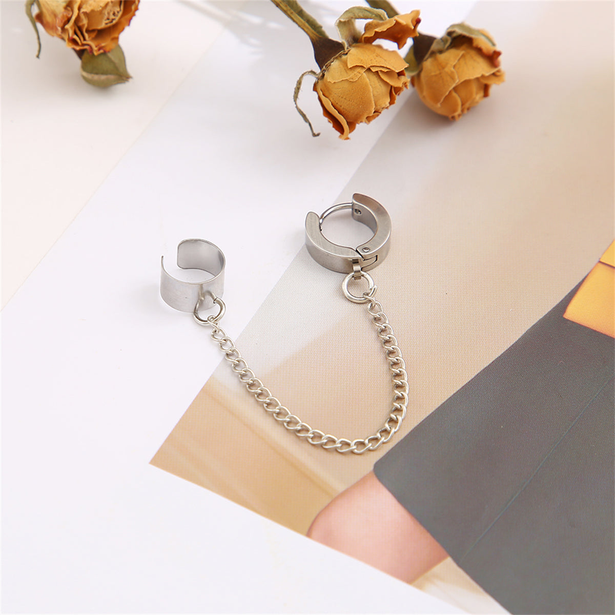 Silver-Plated Huggie Earring and Chain Ear Cuff, silver huggie earrings, dainty minimalist design, detail close-up