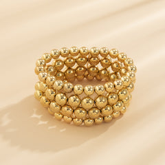 Fashionable 18K gold-plated bead bracelet with a layered design, showcasing a collection of eye-catching balls.