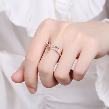 Cubic Zirconia and 18K Rose Gold-Plated Pavé Openwork Bow Bypass Ring, rose gold statement rings for women, lifestyle look