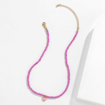 Pink Enamel and Howlite Beaded Heart Necklace, pendant necklace for women, everyday style, styled look