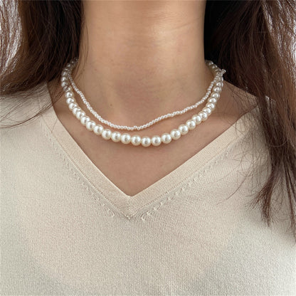 Silver-Plated and Pearl Layered Necklace, silver pendant necklace for women, dainty minimalist design, front view