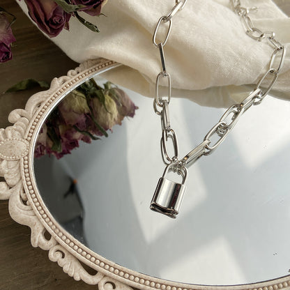 Silver-Plated Lock Pendant Necklace, silver pendant necklace for women, vintage-inspired design, side view