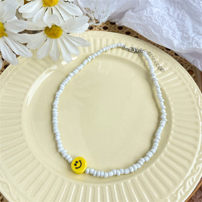 Yellow and White Howlite Smiley Face Beaded Necklace, pendant necklace for women, dainty minimalist design, lifestyle look