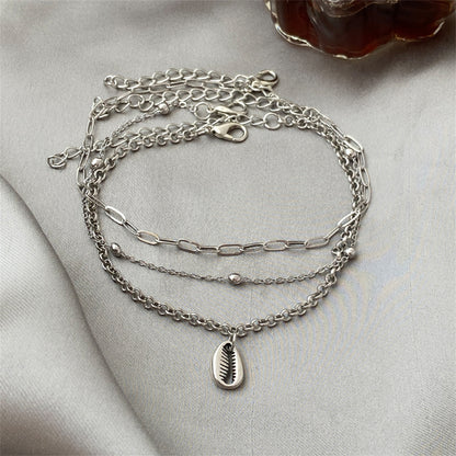 Silver-Plated Shell Charm Anklet Set, jewelry gift sets for women, vintage-inspired design, lifestyle look