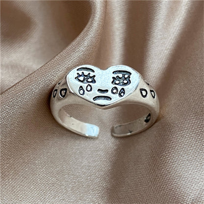 Silver-Plated Crying Heart Open Band Ring, silver statement rings for women, dainty minimalist design, front view