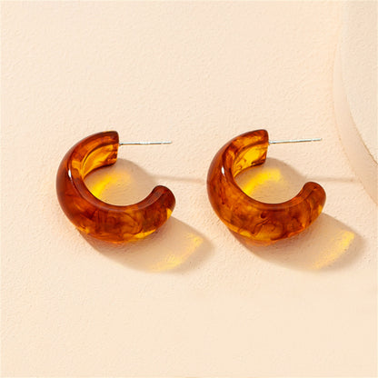 Amber Resin and Silver-Plated Huggie Earrings, silver huggie earrings, dainty minimalist design, side view