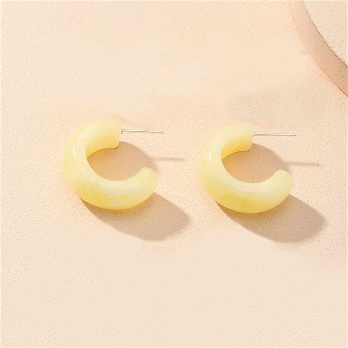 Yellow Swirl Chunky Hoop Earrings, stud earrings for women, dainty minimalist design, front view