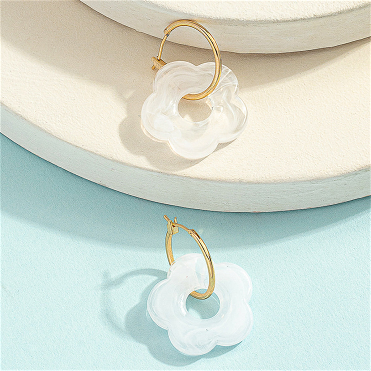 White Resin and 18K Gold-Plated Floral Huggie Earrings, gold huggie earrings, vintage-inspired design, lifestyle look