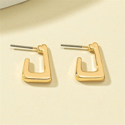 18K Gold-Plated G-Shape Huggie Earrings, gold huggie earrings, vintage-inspired design, detail close-up