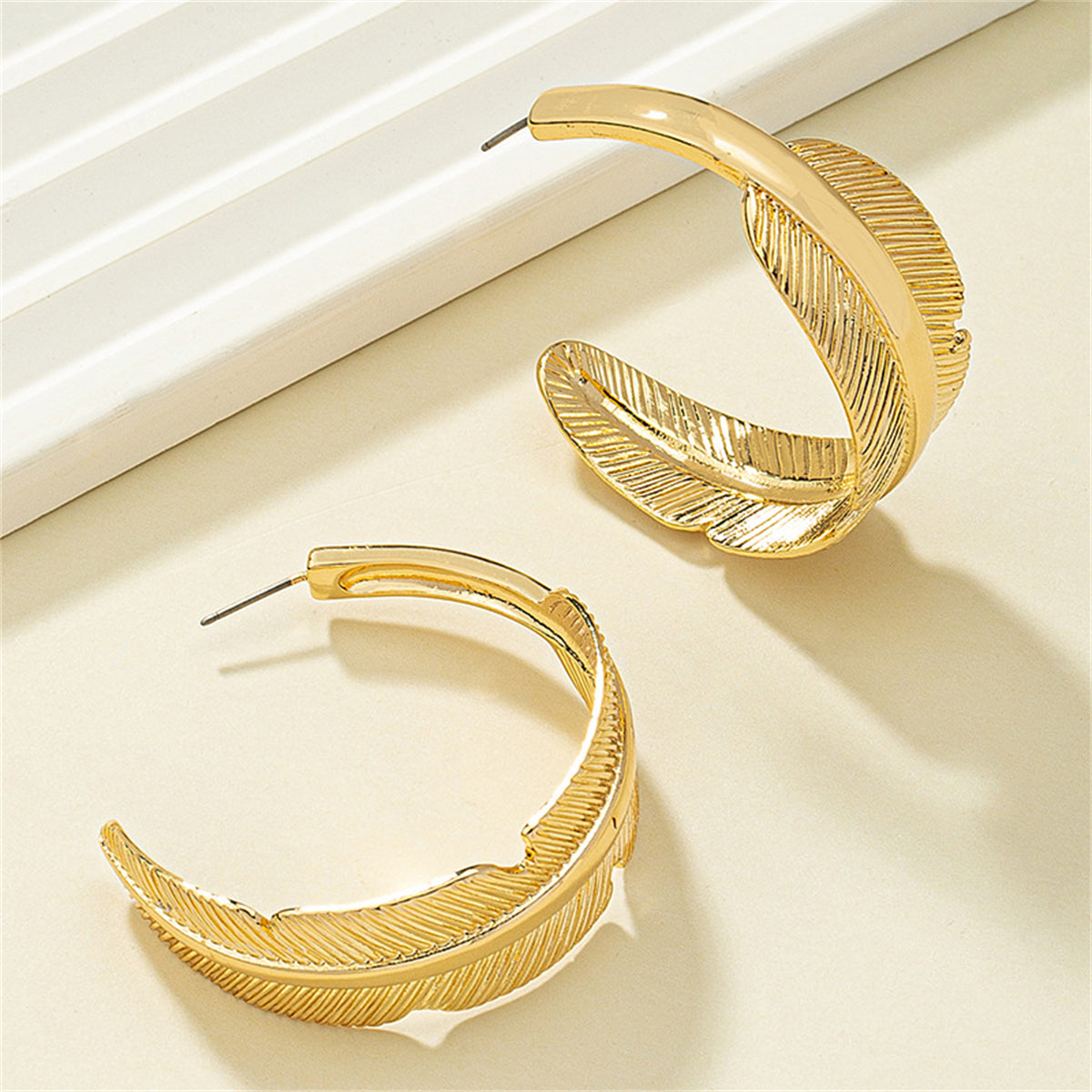 18K Gold-Plated Feather Hoop Earrings, dainty minimalist design, lifestyle look