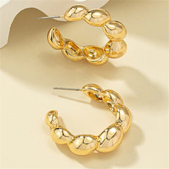 Stunning 18K gold-plated bead hoop earrings that elevate your style with their chic and timeless design.