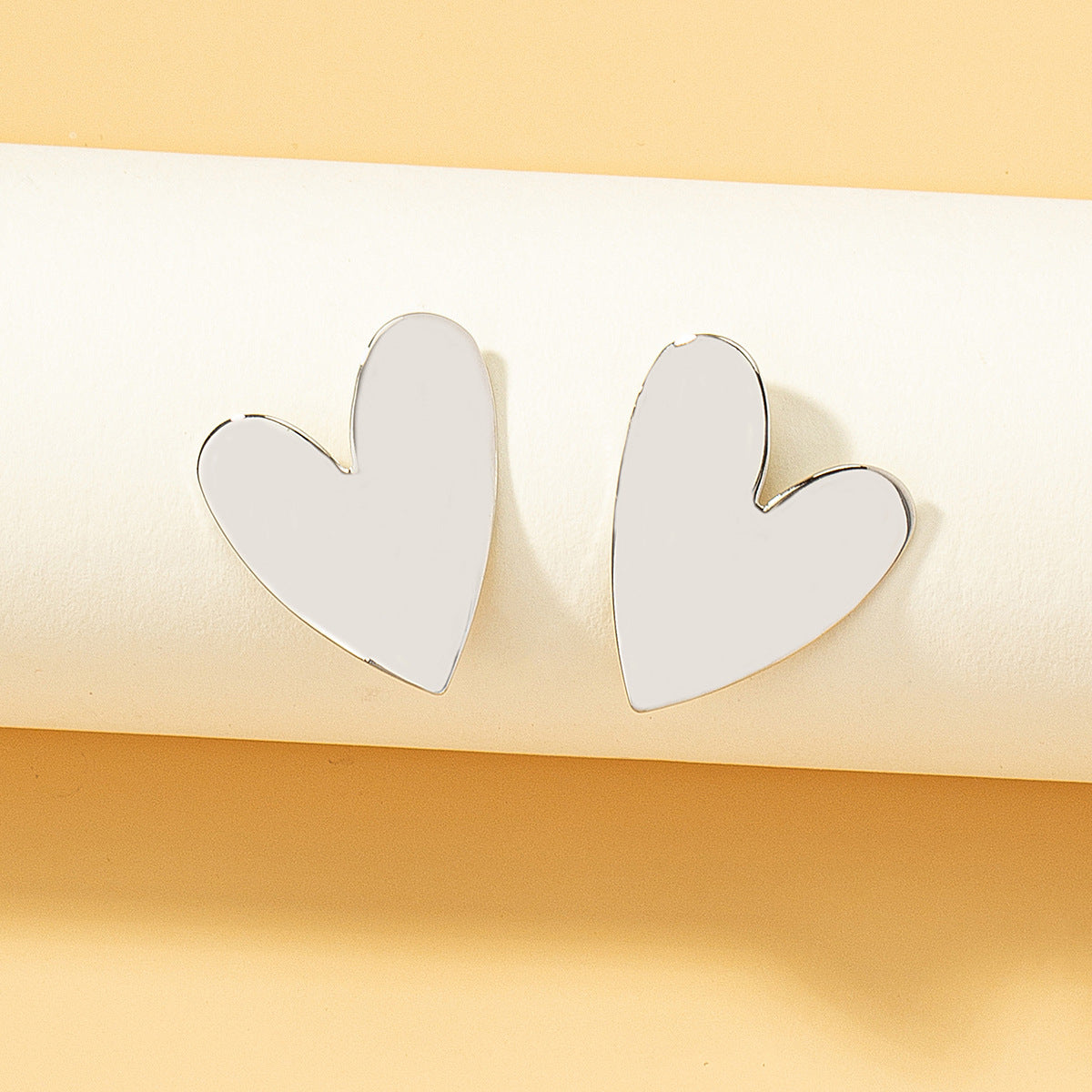 Silver-Plated Heart Stud Earrings, silver stud earrings for women, elegant gift for her, detail close-up