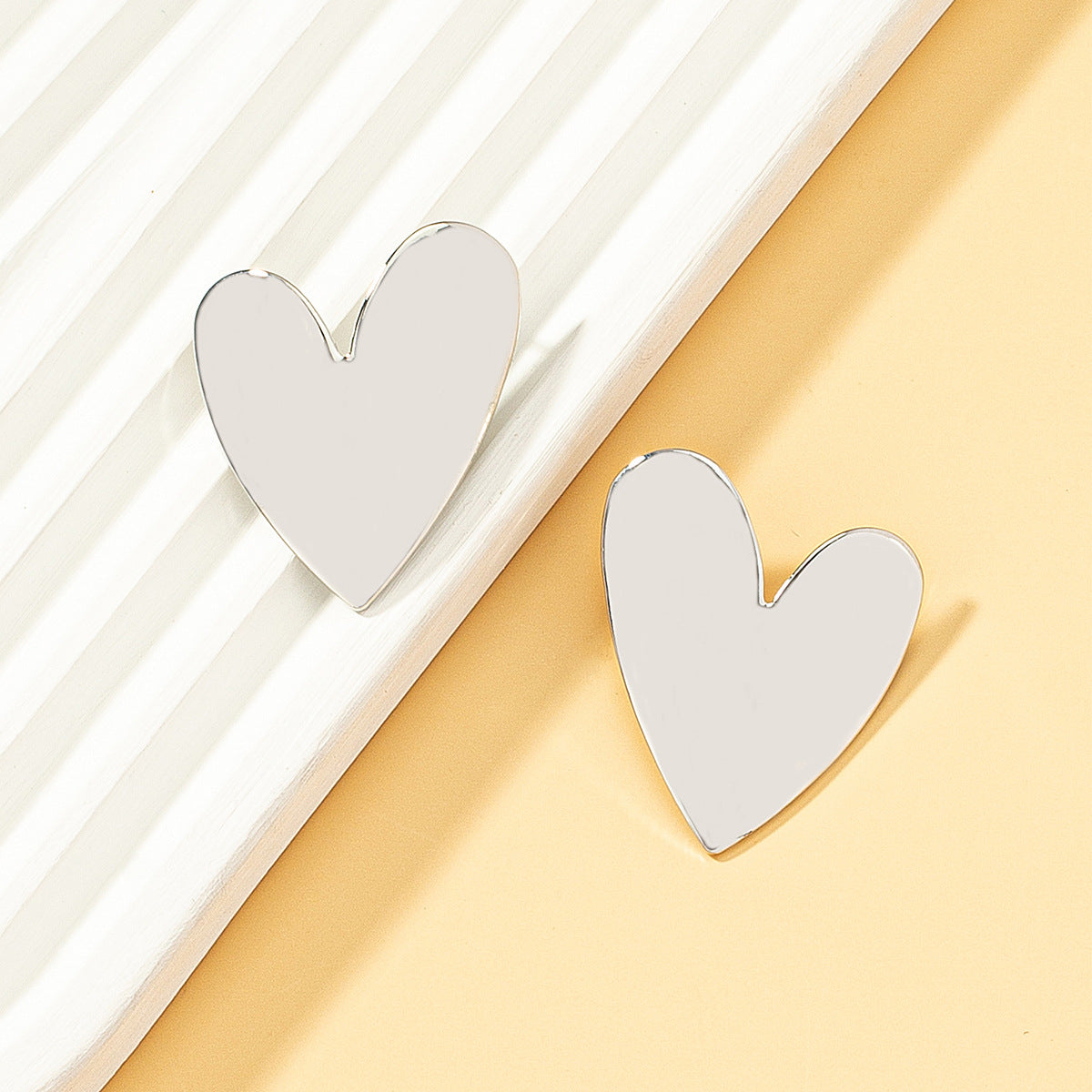 Silver-Plated Heart Stud Earrings, silver stud earrings for women, elegant gift for her, lifestyle look
