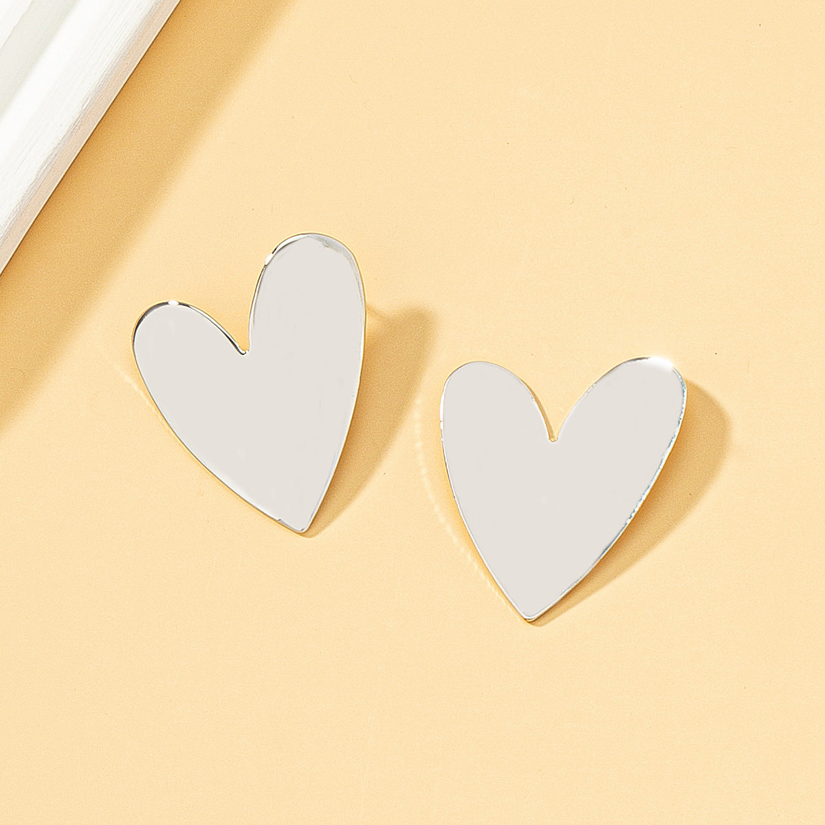 Silver-Plated Heart Stud Earrings, silver stud earrings for women, elegant gift for her, styled look