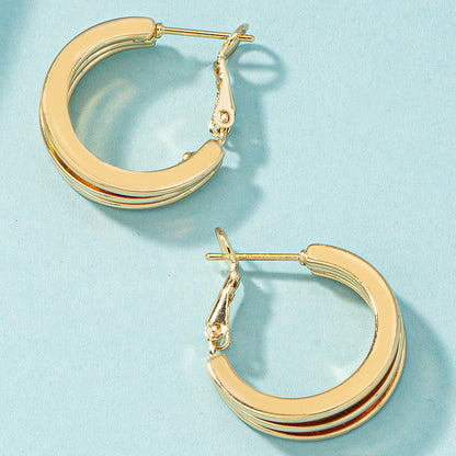 18K Gold-Plated Layered Huggie Earrings, gold huggie earrings, botanical inspired, lifestyle look