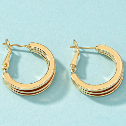 18K Gold-Plated Layered Huggie Earrings, gold huggie earrings, botanical inspired, side view