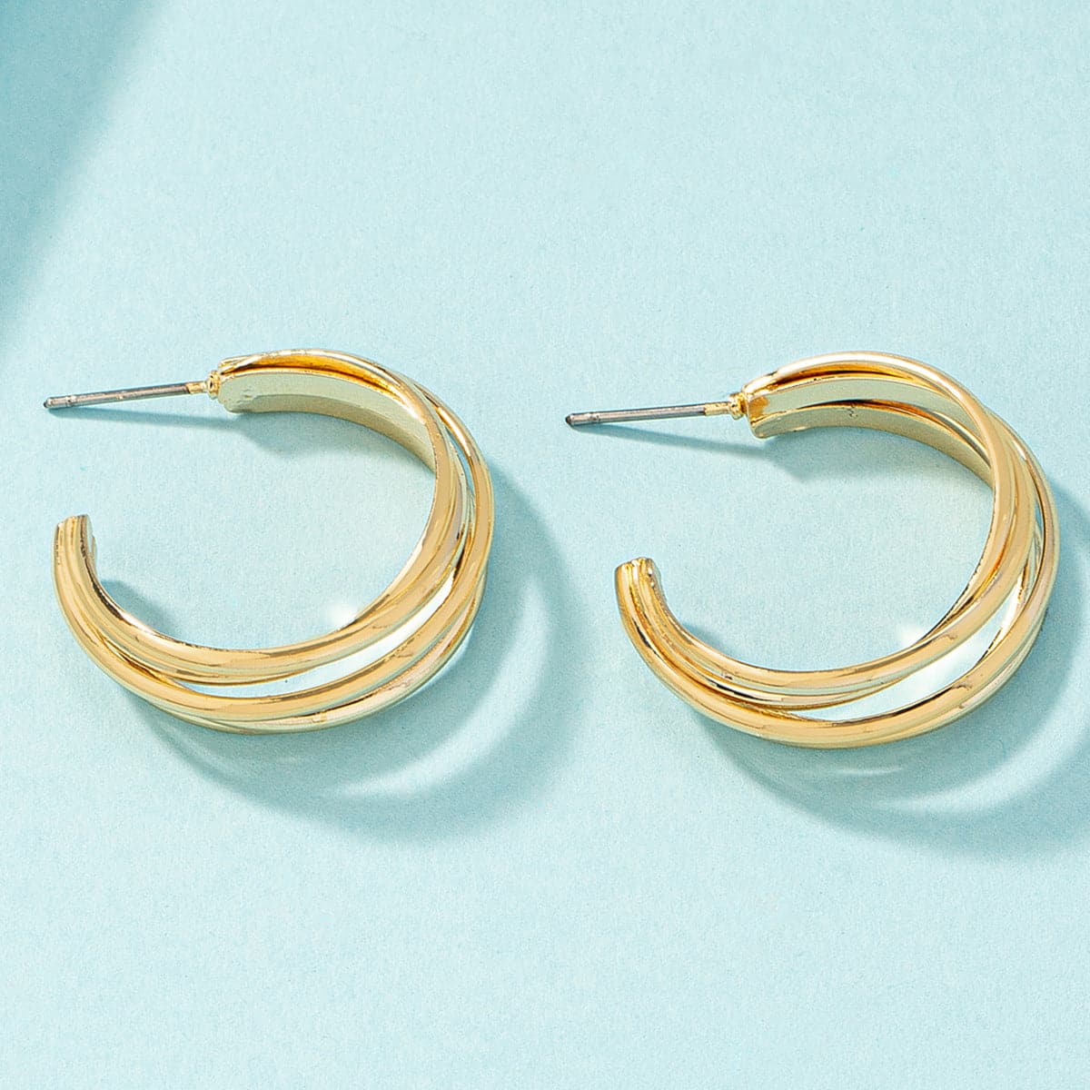 18K Gold-Plated Layered Huggie Earrings, gold huggie earrings, vintage-inspired design, detail close-up