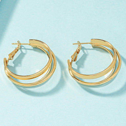 18K Gold-Plated Layered Huggie Earrings, gold huggie earrings, everyday style, detail close-up