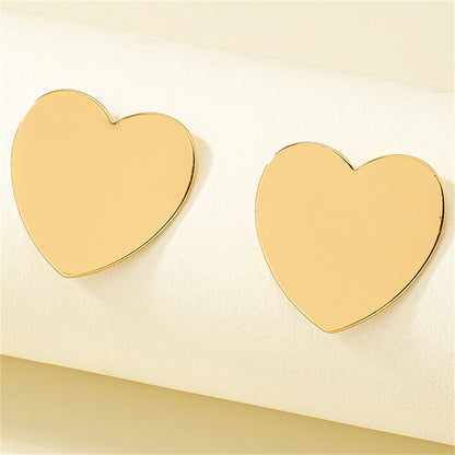 18K Gold-Plated Heart Stud Earrings, gold stud earrings for women, everyday style, detail close-up