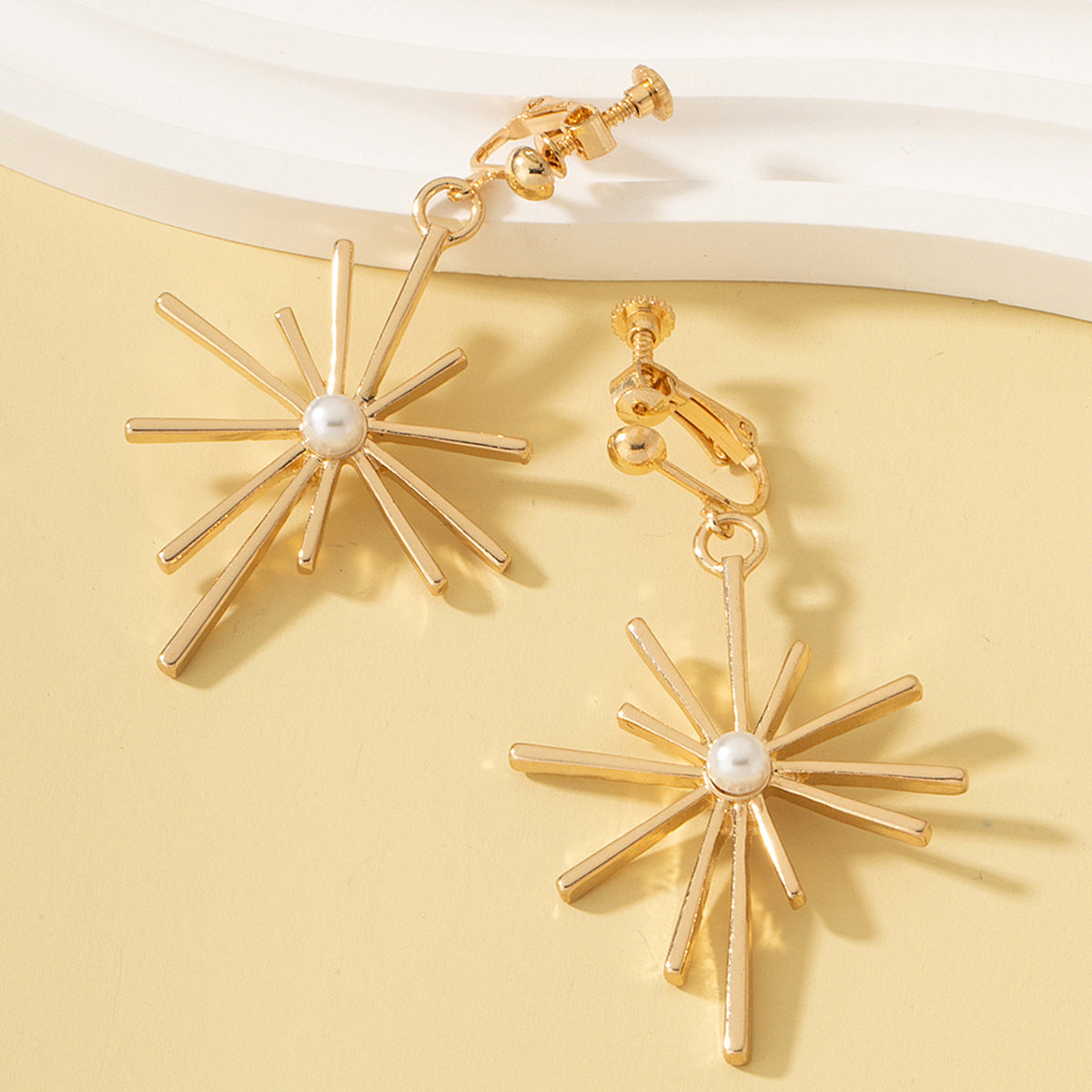 Pearl and 18K Gold-Plated Sunflower Huggie Earrings, gold huggie earrings, dainty minimalist design, side view
