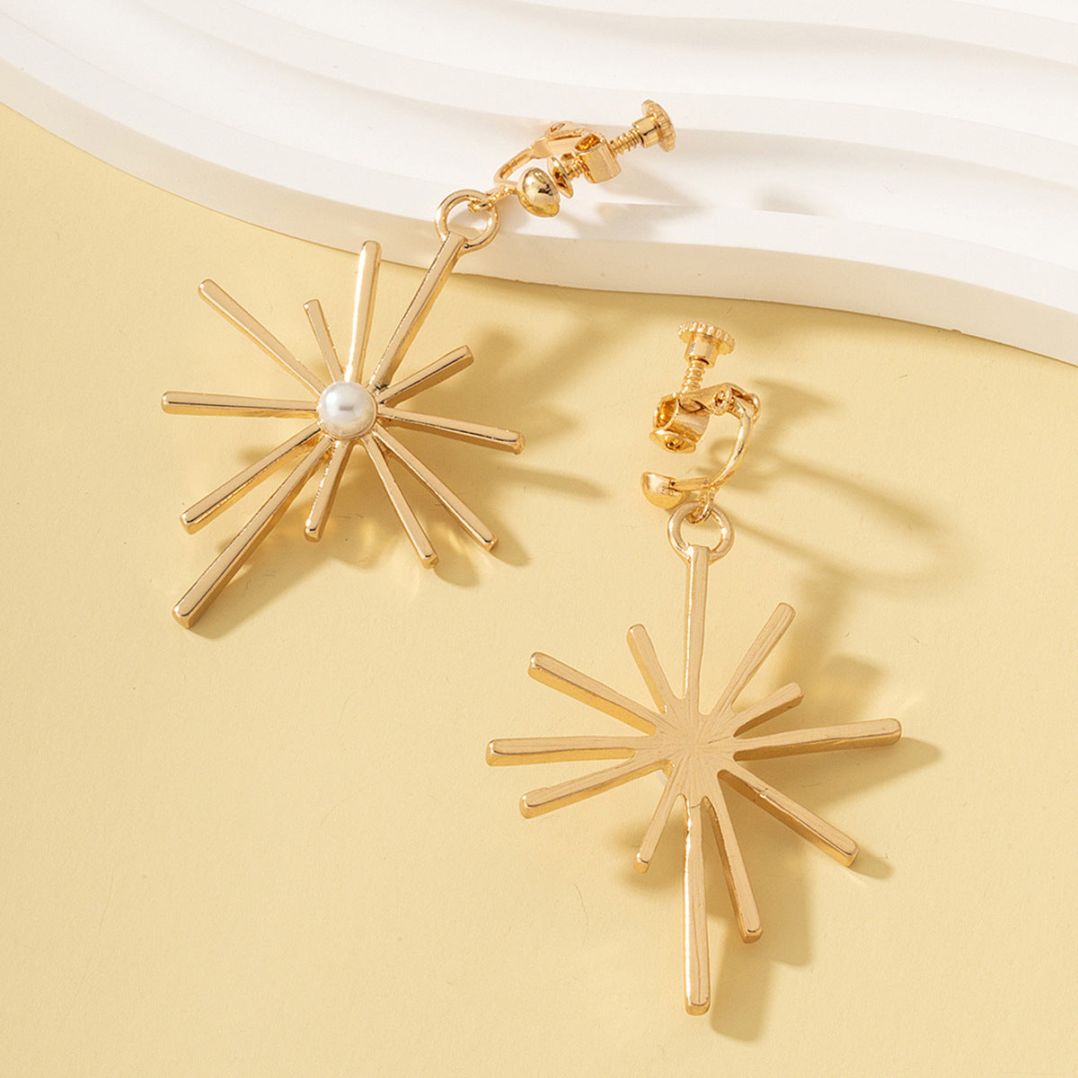 Pearl and 18K Gold-Plated Sunflower Huggie Earrings, gold huggie earrings, dainty minimalist design, lifestyle look