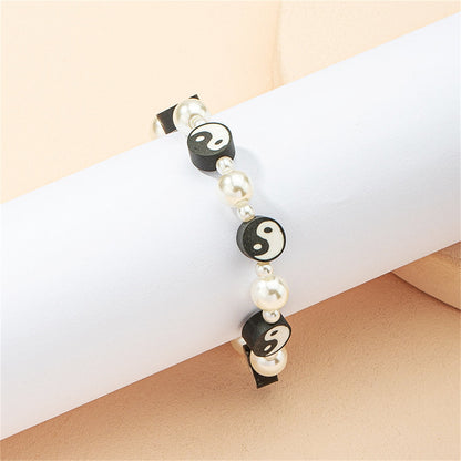 Black Polymer Clay and Pearl Yin Yang Station Bracelet, bracelet for women, botanical inspired, detail close-up