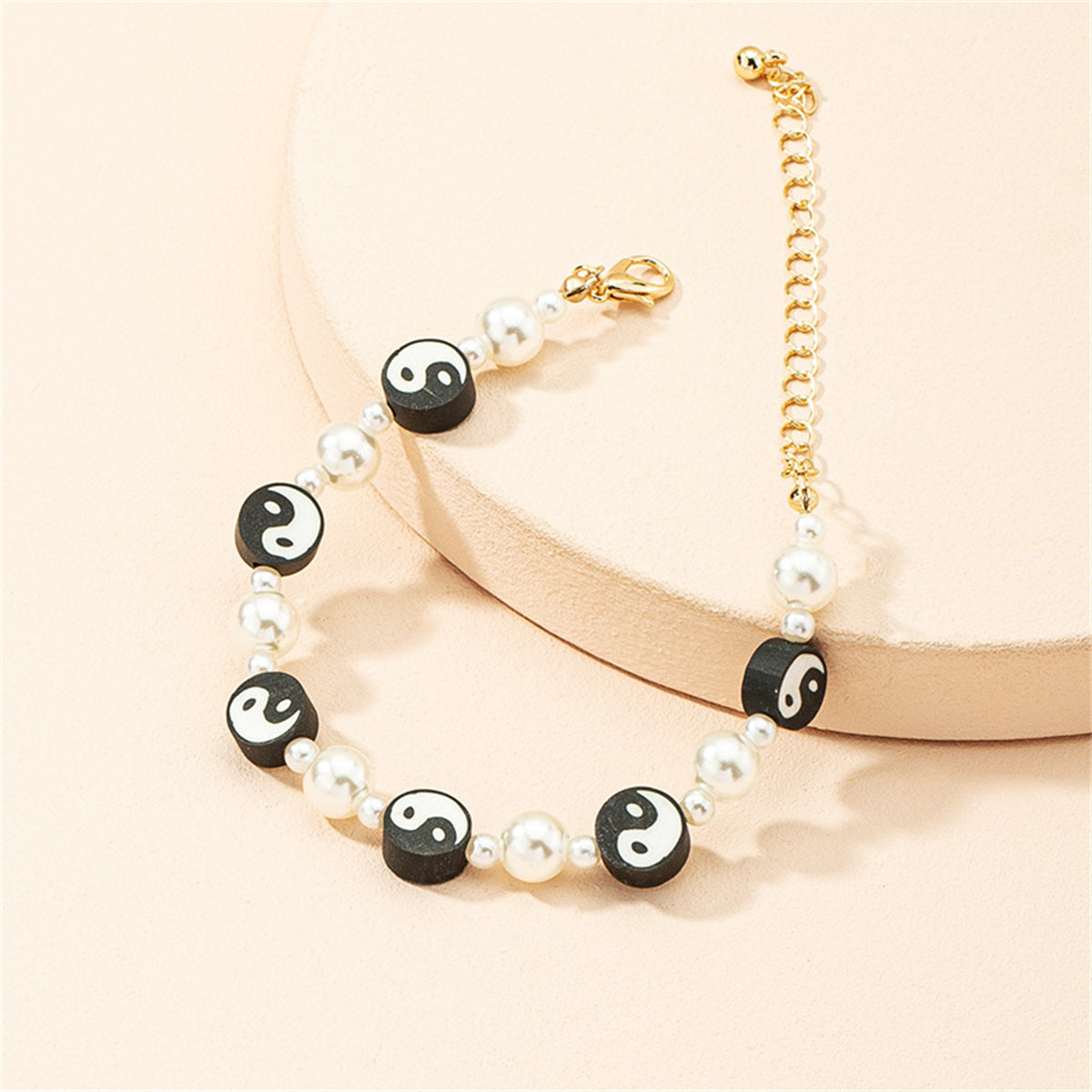 Black Polymer Clay and Pearl Yin Yang Station Bracelet, bracelet for women, botanical inspired, side view