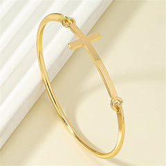 18K gold-plated cross bangle, a fashionable accessory that beautifully blends elegance with a meaningful design.