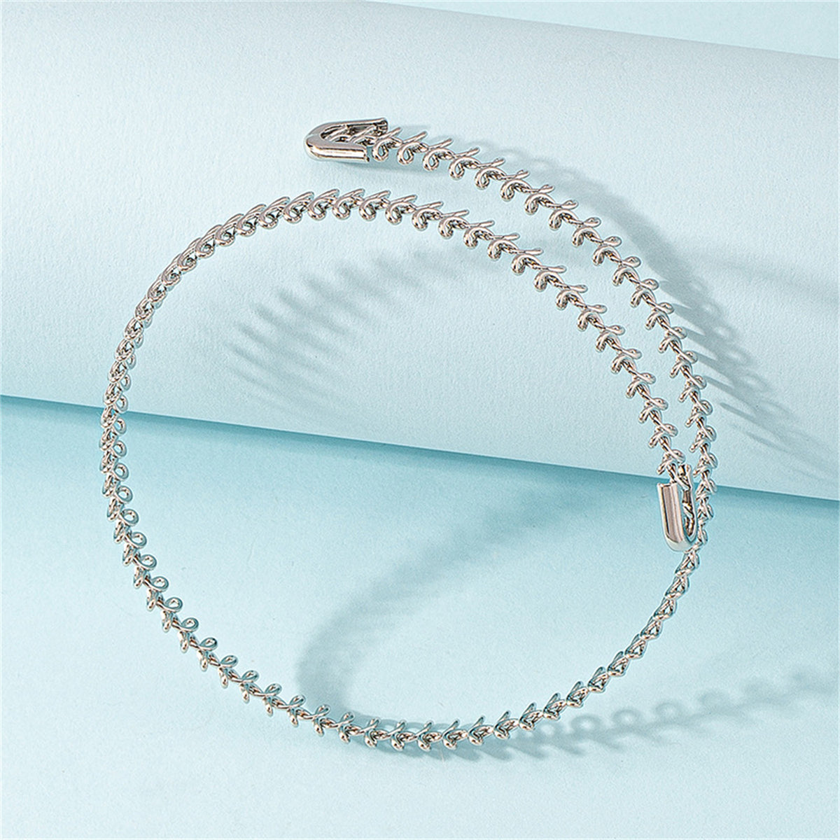 Silver-Plated Fishbone Choker Necklace, chunky silver choker necklace, vintage-inspired design, side view