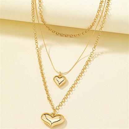 18K Gold-Plated Heart Layered Pendant Necklace, gold pendant necklace for women, vintage-inspired design, side view