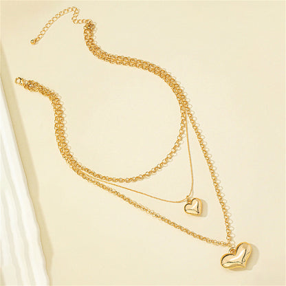 18K Gold-Plated Heart Layered Pendant Necklace, gold pendant necklace for women, vintage-inspired design, detail close-up