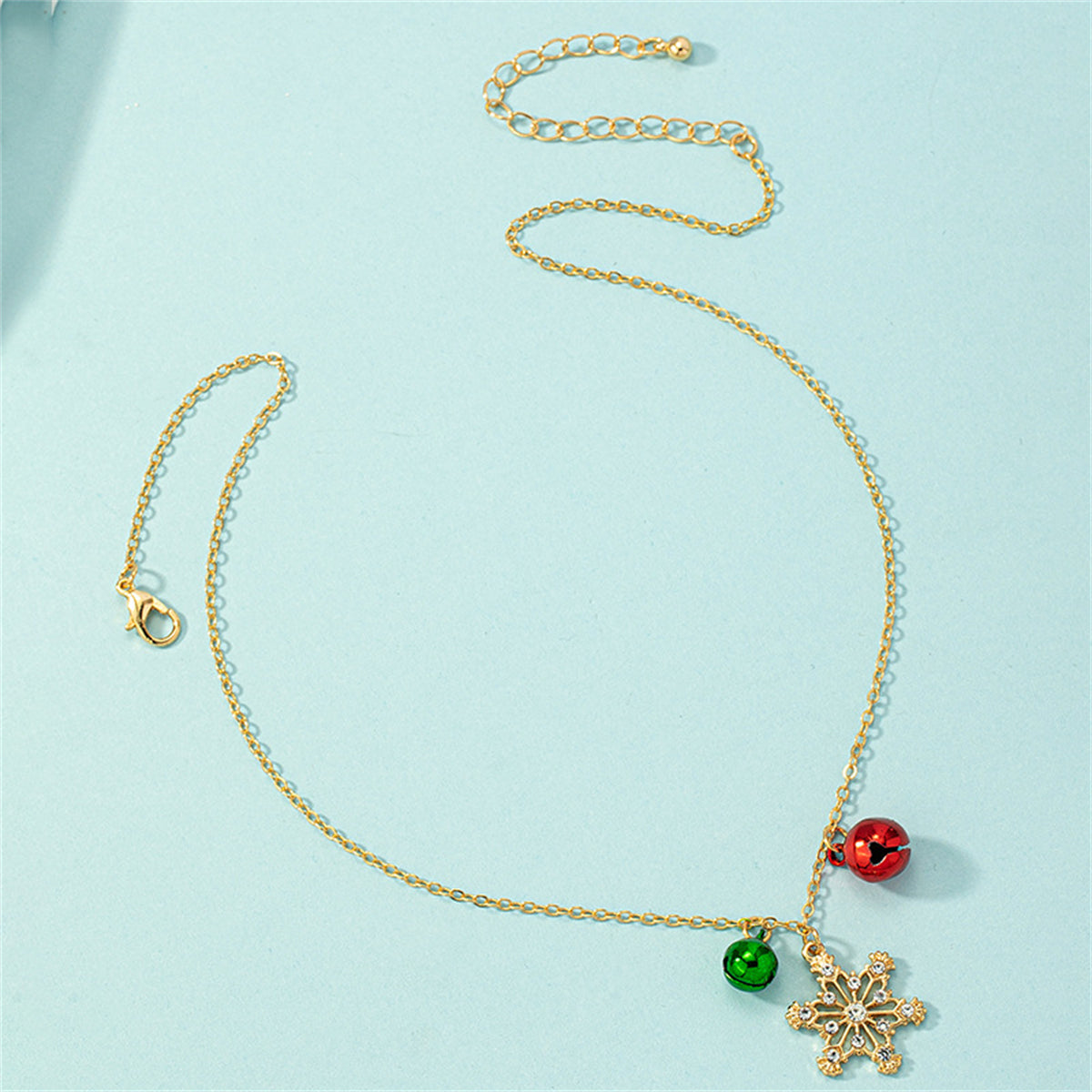 Cubic Zirconia and 18K Gold-Plated Snowflake Bell Pendant Necklace, gold pendant necklace for women, detail close-up