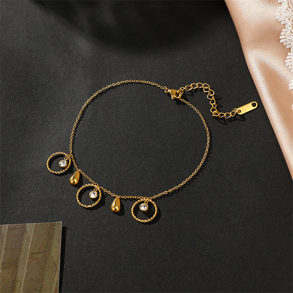 Cubic Zirconia and 18K Gold-Plated Circle Charm Anklet, gold anklet bracelet, botanical inspired, side view