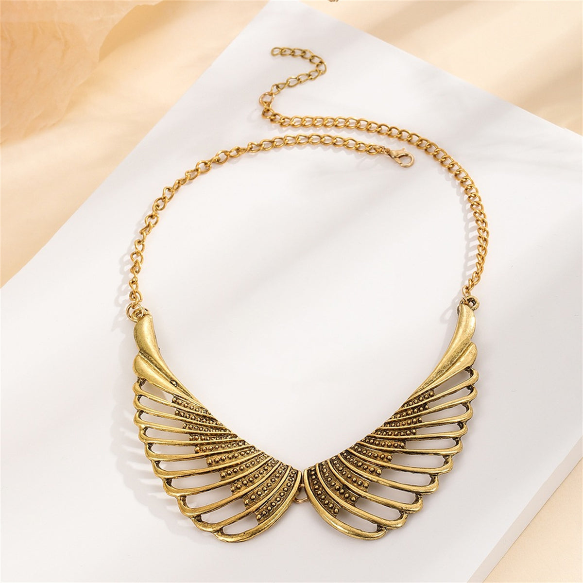 18K Gold-Plated Wing Bib Necklace, gold pendant necklace for women, botanical inspired, lifestyle look