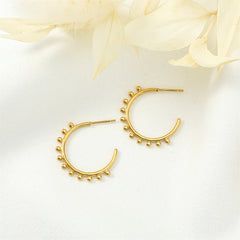 Chic 18K gold-plated huggie earrings designed with small beads, a stylish choice for any occasion that demands a touch of glamour.