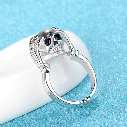 Silver-Plated and Black Skull Ring, silver statement rings for women, dainty minimalist design, detail close-up