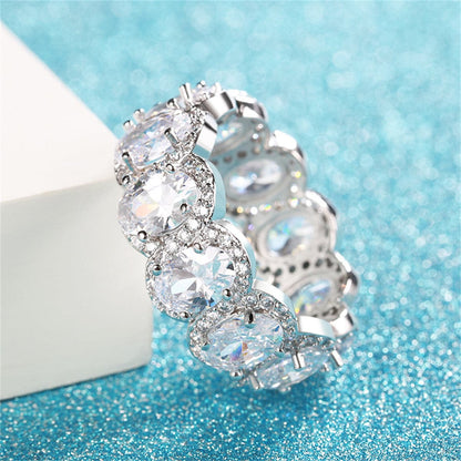 Crystal and Cubic Zirconia Oval-Cut Halo Band Ring, statement rings for women, everyday style, detail close-up