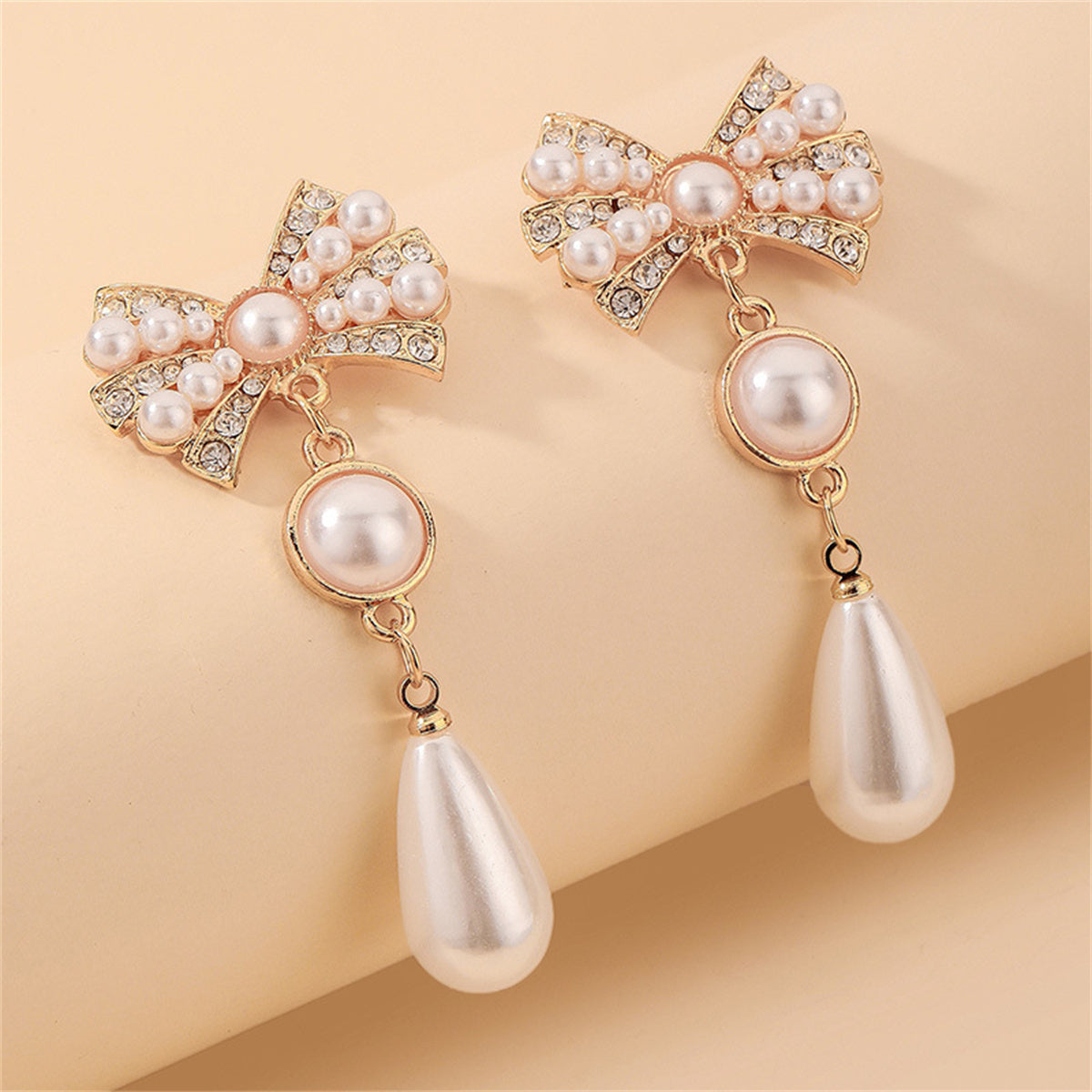 White Cubic Zirconia and Pearl 18K Gold-Plated Bow Drop Earrings, gold drop earrings for women, everyday style, side view