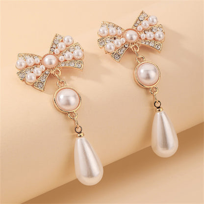 White Cubic Zirconia and Pearl 18K Gold-Plated Bow Drop Earrings, gold drop earrings for women, everyday style, side view