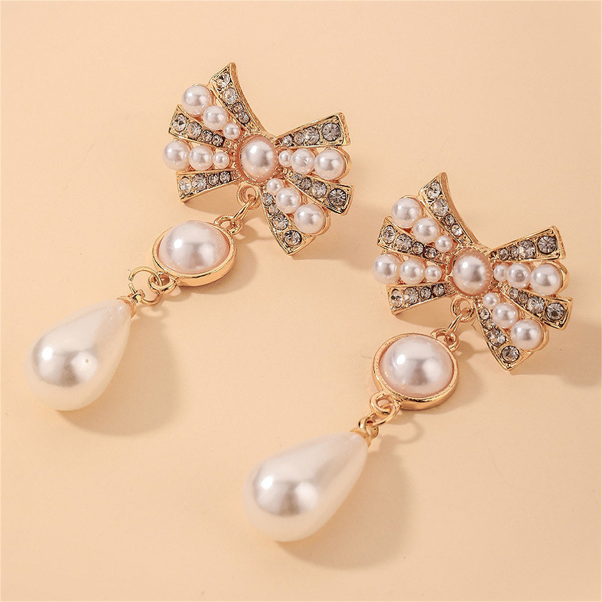 White Cubic Zirconia and Pearl 18K Gold-Plated Bow Drop Earrings, gold drop earrings for women, detail close-up