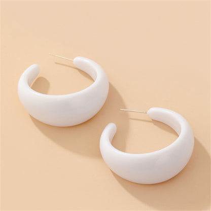White Resin and Silver-Plated Chunky C-Shaped Huggie Earrings, silver huggie earrings, botanical inspired, detail close-up