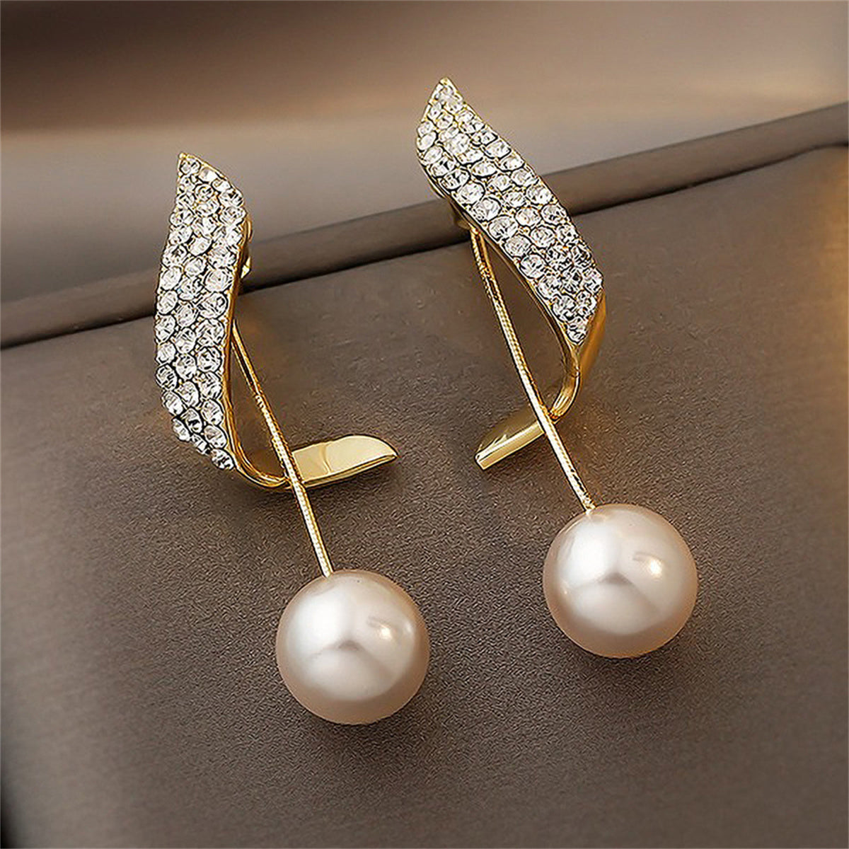 Cubic Zirconia and Pearl Ribbon Ear Jackets, drop earrings for women, dainty minimalist design, lifestyle look