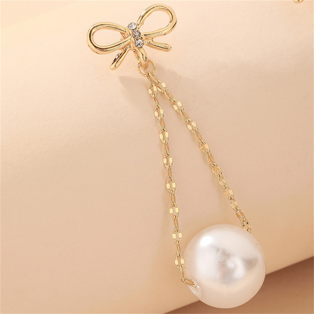 Cubic Zirconia and Pearl 18K Gold-Plated Bow Chain Drop Earrings, gold drop earrings for women, lifestyle look