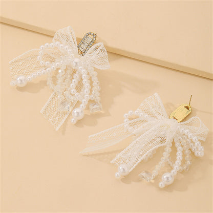 Cubic Zirconia and Crystal Pearl Silver-Plated Bow Drop Earrings, silver drop earrings for women, detail close-up